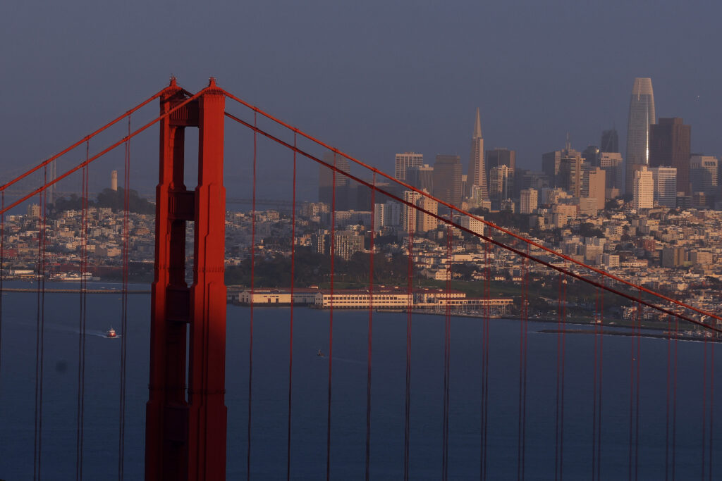 San Francisco's Golden Gate Bridge And City's Skyline