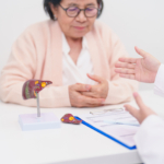 Doctor with human Liver anatomy. Elderly Patient consultation medical health for Liver cancer and Tumor, Jaundice, Viral Hepatitis, Cirrhosis, Failure, Enlarged, Hepatic Encephalopathy, Ascites Fluid