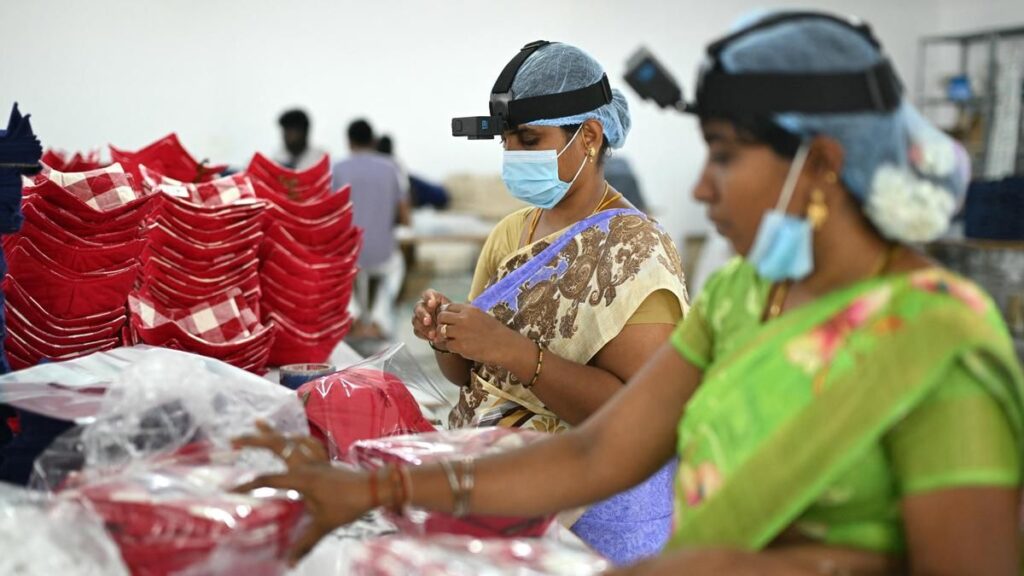 TOPSHOT-INDIA-TECHNOLOGY-LABOUR-AI