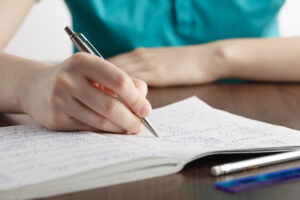 girl solving a math problem