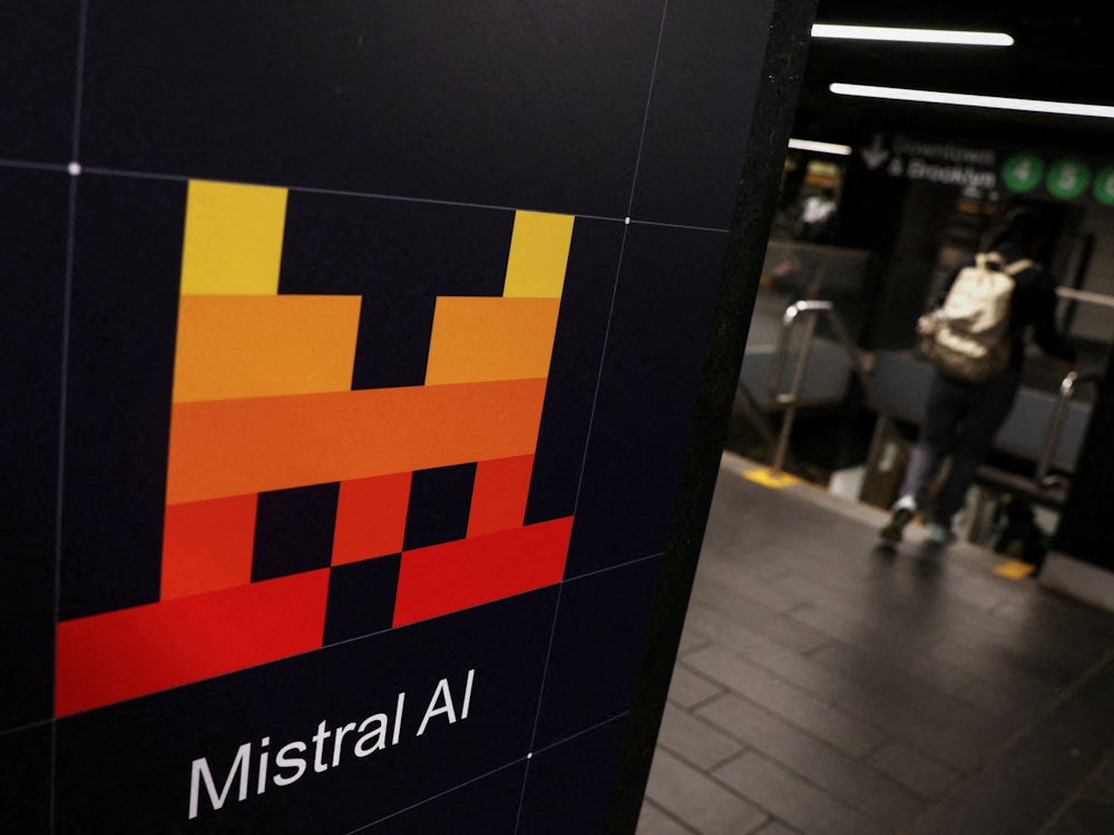 FILE PHOTO: Advertisements for Mistral AI, the French artificial intelligence company, are displayed inside the Grand Central subway station in New York City
